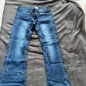 Denim jeans with star detail